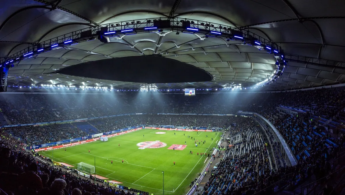 Arena under floodlights on matchday